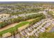 Beautiful view of a golf course community with picturesque homes and tree-lined streets at 5358 Birdie Ln, Hollywood, SC 29449