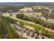 Homes overlooking a golf course, offering picturesque views and a tranquil setting at 5358 Birdie Ln, Hollywood, SC 29449