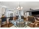 Open-concept living space with kitchen, dining area, and living room, perfect for entertaining and Gathering gatherings at 5358 Birdie Ln, Hollywood, SC 29449