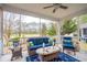 Relaxing screened porch with nice outdoor views and comfortable seating at 5358 Birdie Ln, Hollywood, SC 29449