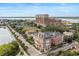 Scenic aerial view highlights a vibrant community nestled by a serene lake and modern skyline at 55 Ashley Ave # 19, Charleston, SC 29401