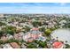 Captivating aerial view of a vibrant town featuring historic buildings, lush greenery, and scenic waterfront at 55 Ashley Ave # 19, Charleston, SC 29401