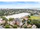 Attractive aerial view features a picturesque lake, historic building, tennis courts and vibrant community at 55 Ashley Ave # 19, Charleston, SC 29401