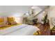 Bedroom featuring a cozy seating area and a vintage desk illuminated by natural light at 55 Ashley Ave # 19, Charleston, SC 29401