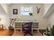 The vintage desk is illuminated by natural light, creating an inviting workspace within the bedroom at 55 Ashley Ave # 19, Charleston, SC 29401