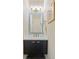 Elegant powder room featuring modern fixtures, stylish lighting, and beautiful decorative tile at 55 Ashley Ave # 19, Charleston, SC 29401