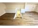 Basement entrance with door leading down to lower level from the bonus room at 6 Allison Ct, Charleston, SC 29407