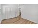 Bedroom with hardwood floors, ceiling fan, and white closet at 6 Allison Ct, Charleston, SC 29407