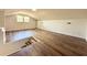 Spacious bonus room with new flooring and natural light from the window at 6 Allison Ct, Charleston, SC 29407