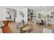 Open-concept living space showcases hardwood floors connecting the living room and dining area in a bright setting at 6 Allison Ct, Charleston, SC 29407