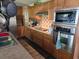 Well-equipped kitchen with wooden cabinets, modern appliances, and ample counter space at 60 Caboose Ct, Cottageville, SC 29435