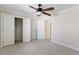 Neutral bedroom with standard closet and open door allowing transition to other rooms in the house at 644 Stoneboro Ct, Charleston, SC 29412