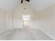 This bonus room boasts neutral carpet, a ceiling fan, and staircase access to other levels at 644 Stoneboro Ct, Charleston, SC 29412