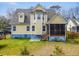 A screened porch, a yard, and the back of the yellow two-story house are visible at 644 Stoneboro Ct, Charleston, SC 29412