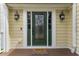 Welcoming front door with decorative details and stylish outdoor lighting at 644 Stoneboro Ct, Charleston, SC 29412
