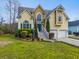 Charming two-story home with a well manicured lawn and two-car garage at 644 Stoneboro Ct, Charleston, SC 29412