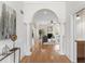 Open hallway leads to a cozy living room with fireplace and a back patio at 644 Stoneboro Ct, Charleston, SC 29412