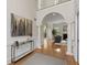Open hallway leads to a cozy living room with fireplace and a back patio at 644 Stoneboro Ct, Charleston, SC 29412
