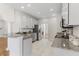Bright kitchen features granite countertops, stainless appliances, and white cabinetry at 644 Stoneboro Ct, Charleston, SC 29412