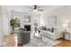 Cozy living room showcasing a fireplace, hardwood floors, and comfortable seating at 644 Stoneboro Ct, Charleston, SC 29412