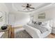 Spacious bedroom offering tray ceilings, ceiling fan, and a serene color scheme at 644 Stoneboro Ct, Charleston, SC 29412