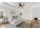 Relaxing bedroom featuring a ceiling fan, natural light, and calming decor at 644 Stoneboro Ct, Charleston, SC 29412