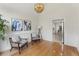 Sitting room with a large window, vaulted ceilings, and a modern chandelier at 644 Stoneboro Ct, Charleston, SC 29412