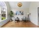 Sitting room with a large window, vaulted ceilings, and a modern chandelier at 644 Stoneboro Ct, Charleston, SC 29412