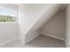 Storage room featuring neutral carpet, base molding, and natural light at 644 Stoneboro Ct, Charleston, SC 29412