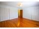 Spacious bedroom with hardwood floors and dual closets at 7 Doughty St # C, Charleston, SC 29403
