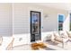 Stylish front door with glass insert and a 'LENNAR' welcome mat at 794 Clay Field Trl, Summerville, SC 29485