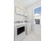 Bright laundry room includes a washer and dryer and decor accents at 796 Clay Field Trl, Summerville, SC 29485