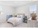 Cozy bedroom with large windows, a neutral color palette, and plenty of natural light at 796 Clay Field Trl, Summerville, SC 29485