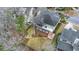 Aerial view of the home with well-maintained landscaping, screened in porch, and a large backyard at 8661 Refuge Point Cir, North Charleston, SC 29420
