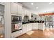 Bright kitchen featuring gas cooktop, stainless steel appliances and a breakfast nook at 8661 Refuge Point Cir, North Charleston, SC 29420