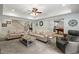 Relaxing living area with comfortable seating, neutral decor, and easy access to the kitchen and billiard room at 8661 Refuge Point Cir, North Charleston, SC 29420