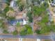 Aerial shot showcasing the home's setting among mature trees, offering privacy at 9030 Ethel Rd, North Charleston, SC 29406