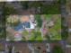 Stunning aerial view of a home with mature trees and a large driveway at 9030 Ethel Rd, North Charleston, SC 29406