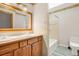 Bathroom with double sinks and decorative backsplash at 9030 Ethel Rd, North Charleston, SC 29406