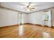 This bedroom offers abundant natural light and hardwood floors at 9030 Ethel Rd, North Charleston, SC 29406