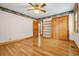 Bedroom with hardwood floors, closet and shelving space at 9030 Ethel Rd, North Charleston, SC 29406