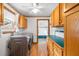Laundry room with washer, dryer, and ample cabinet space at 9030 Ethel Rd, North Charleston, SC 29406