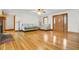 Elegant living room boasts hardwood floors, a front door, and ample seating at 9030 Ethel Rd, North Charleston, SC 29406