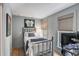 Comfortable bedroom featuring hardwood floors and a large window at 92 Bogard St, Charleston, SC 29403