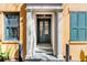 Welcoming entrance featuring a classic door with white trim, steps, and a glimpse of the interior at 92 Bogard St, Charleston, SC 29403