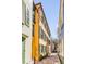 Exterior view of a beautiful yellow building between other buildings at 92 Bogard St, Charleston, SC 29403