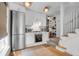 Bright kitchen with stainless steel appliances and ample cabinet space at 92 Bogard St, Charleston, SC 29403