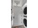 Modern laundry closet with stacked washer and dryer units at 92 Bogard St, Charleston, SC 29403