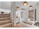 Open-concept space with stairs and bright lighting with ample natural light at 92 Bogard St, Charleston, SC 29403