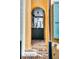 Charming passageway with brick steps and floors beneath an arched opening and lantern at 92 Bogard St, Charleston, SC 29403